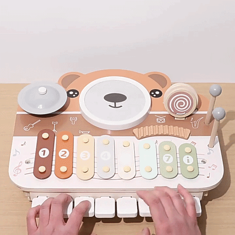 1 guiro-ratterelement-musikspielzeug-holz-detail