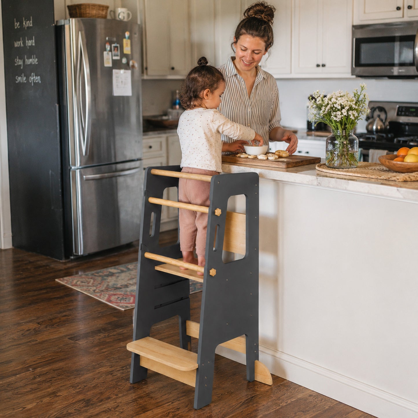 Adjustable wooden learning tower supporting children as they grow