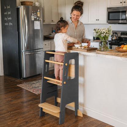 Adjustable wooden learning tower supporting children as they grow