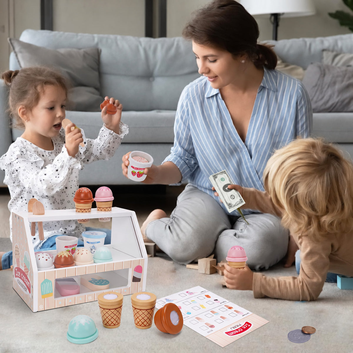 Kinder spielen mit einer kleinen Eisdiele im Rollenspiel