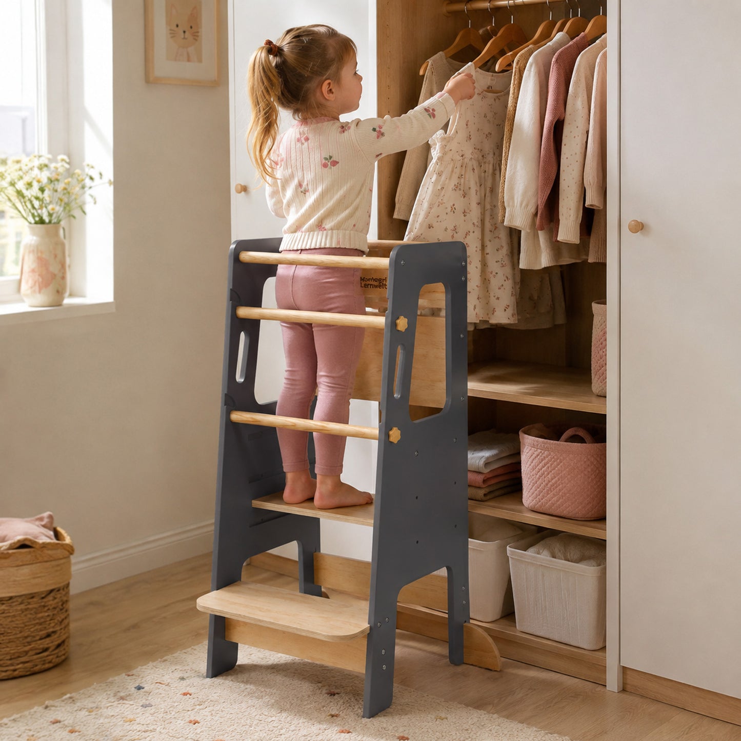Montessori tower allowing children to participate in family kitchen activities